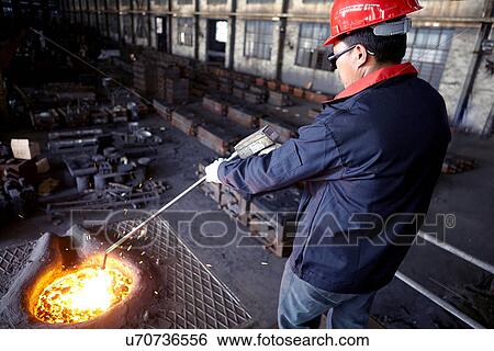 Working in cast iron foundry View Large Photo Image Stock Photograph - Working in cast iron foundry. Fotosearch