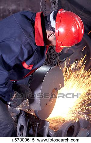 Stock Photography - Working in cast iron foundry. Fotosearch