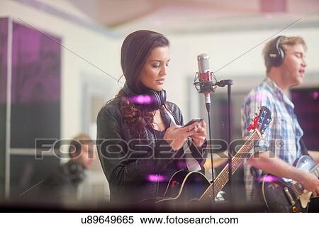 Young band in recoding studio View Large Photo Image Stock Photography - Young band in recoding studio. Fotosearch