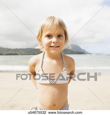 Baby girl (2-3) on beach View Large Photo Image Stock Image - Baby girl (2-3) on beach. Fotosearch