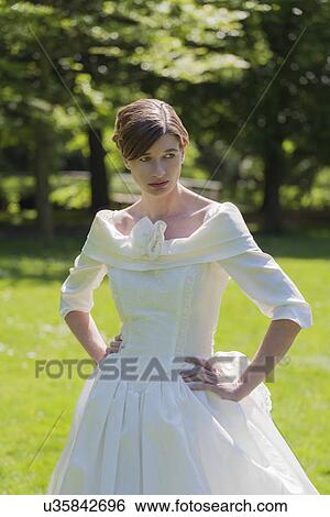 Bride in summer garden View Large Photo Image Stock Photograph - Bride in summer garden. Fotosearch