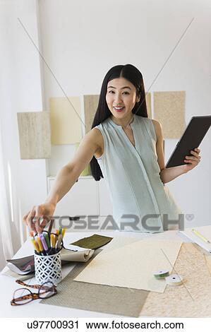 Business woman using tablet pc View Large Photo Image Stock Image - Business woman using tablet pc. Fotosearch