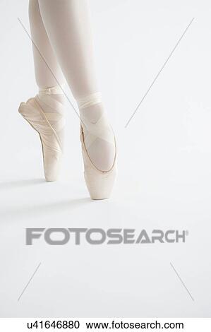 Stock Image - Close up of girls (16-17) ballet shoes. Fotosearch