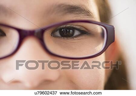 Close-up view of girl's (12-13) face View Large Photo Image Stock Photo - Close-up view of girl's (12-13) face. Fotosearch