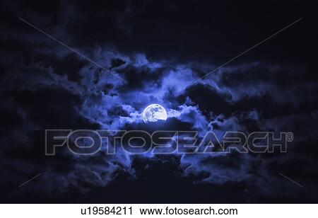 Dramatic sky with full moon View Large Photo Image Stock Image - Dramatic sky with full moon. Fotosearch