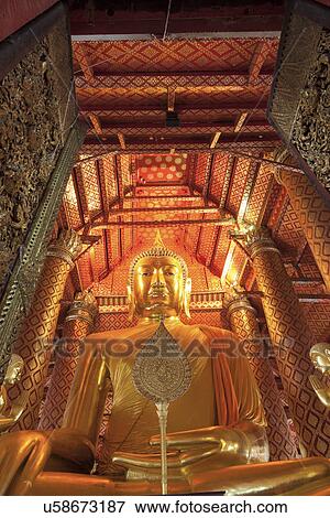 Stock Photo - Interior view of temple with Budda statue. Fotosearch