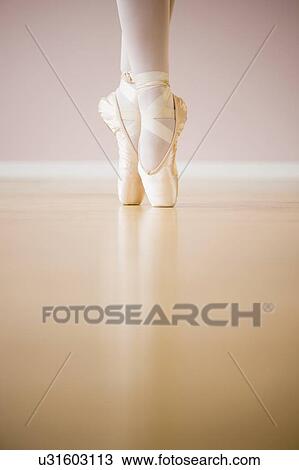 Low section of ballet dancer (16-17) tiptoing View Large Photo Image Stock Image - Low section of ballet dancer (16-17) tiptoing. Fotosearch