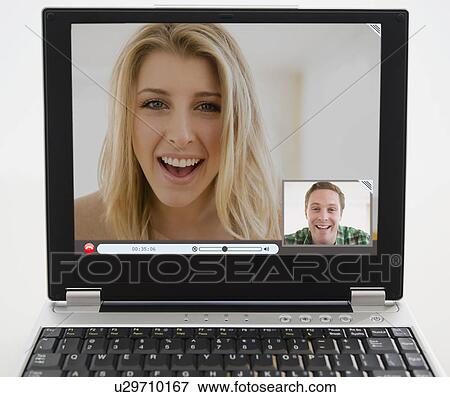Man and woman chatting on computer View Large Photo Image Stock Photo - Man and woman chatting on computer. Fotosearch