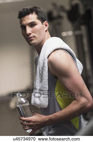 Stock Image - Man in gym. Fotosearch