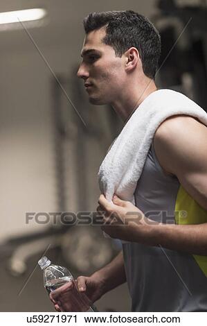 Stock Image - Man in gym. Fotosearch
