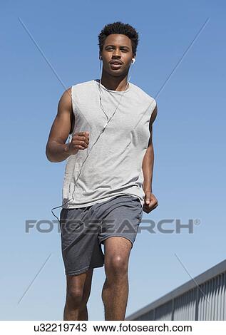 Stock Image - Man jogging. Fotosearch