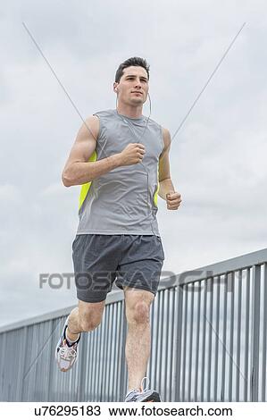 Stock Image - Man jogging. Fotosearch