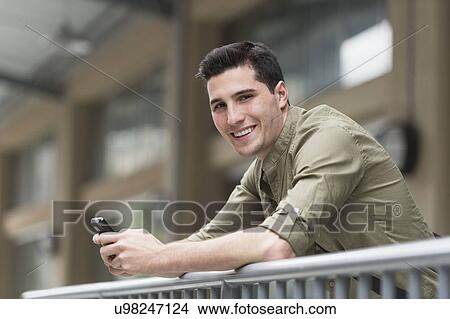 Man text messaging View Large Photo Image Picture - Man text messaging. Fotosearch