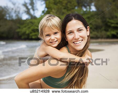 Mother with daughter (2-3) on beach View Large Photo Image Stock Photo - Mother with daughter (2-3) on beach. Fotosearch
