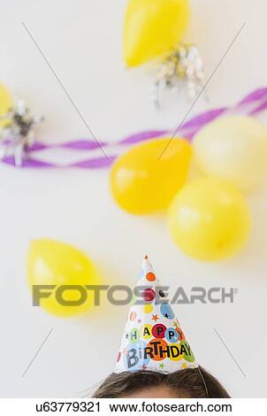 Party hat and balloons View Large Photo Image Stock Image - Party hat and balloons . Fotosearch