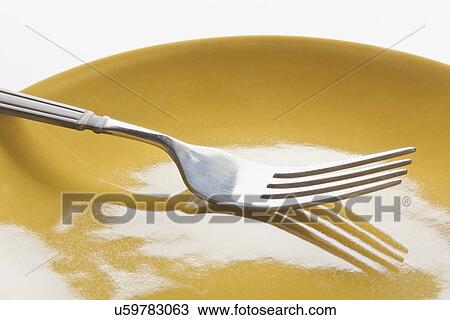 Plate with fork View Large Photo Image Stock Image - Plate with fork. Fotosearch