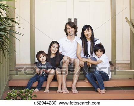 Portrait of family with three kids (2-3, 8-9) View Large Photo Image Stock Image - Portrait of family with three kids (2-3, 8-9). Fotosearch