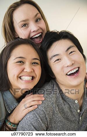 Portrait of happy man and women View Large Photo Image Stock Image - Portrait of happy man and women. Fotosearch