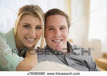 Portrait of happy young couple View Large Photo Image Stock Image - Portrait of happy young couple. Fotosearch