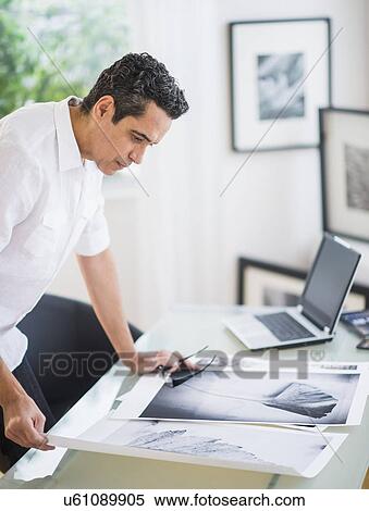 Portrait of man in his photography studio View Large Photo Image Stock Photography - Portrait of man in his photography studio. Fotosearch