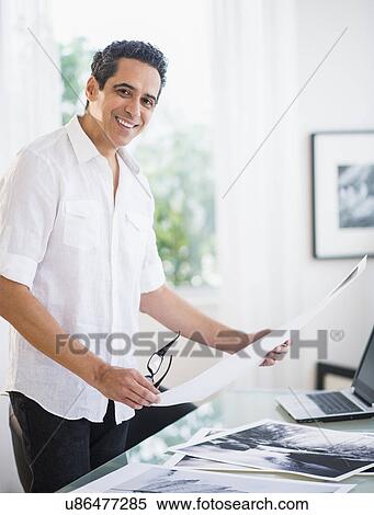 Portrait of man in his photography studio View Large Photo Image Stock Photography - Portrait of man in his photography studio. Fotosearch
