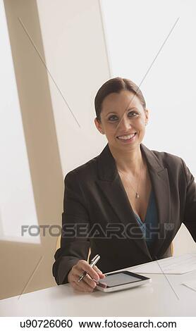 Portrait of mature woman toothy smiling View Large Photo Image Stock Image - Portrait of mature woman toothy smiling. Fotosearch
