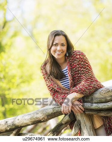 Stock Image - Portrait of mid adult woman. Fotosearch