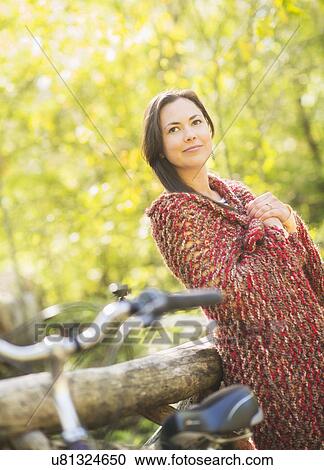 Stock Image - Portrait of mid adult woman. Fotosearch