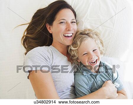 Portrait of mother with son (6-7) View Large Photo Image Picture - Portrait of mother with son (6-7). Fotosearch