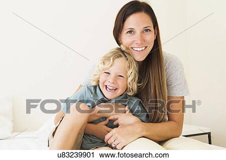 Portrait of mother with son (6-7) View Large Photo Image Stock Image - Portrait of mother with son (6-7). Fotosearch