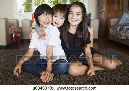 Stock Photography - Portrait of siblings. Fotosearch