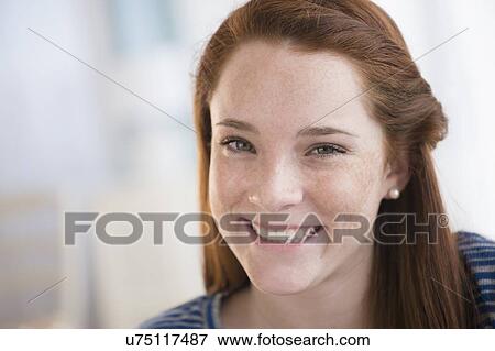 Stock Photo - Portrait of smiling teenage girl (14-15). Fotosearch