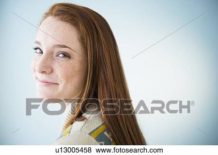 Portrait of smiling teenage girl (14-15), studio shot View Large Photo Image Stock Photo - Portrait of smiling teenage girl (14-15), studio shot. Fotosearch