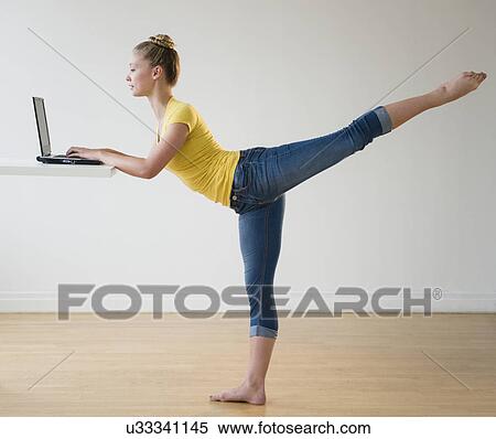 Portrait of teenage (16-17) ballerina using laptop View Large Photo Image Stock Photography - Portrait of teenage (16-17) ballerina using laptop. Fotosearch