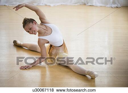 Portrait of teenage ballet dancer (16-17) practicing View Large Photo Image Stock Photo - Portrait of teenage ballet dancer (16-17) practicing. Fotosearch