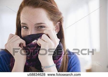 Portrait of teenage girl (14-15) covering face View Large Photo Image Stock Photo - Portrait of teenage girl (14-15) covering face. Fotosearch