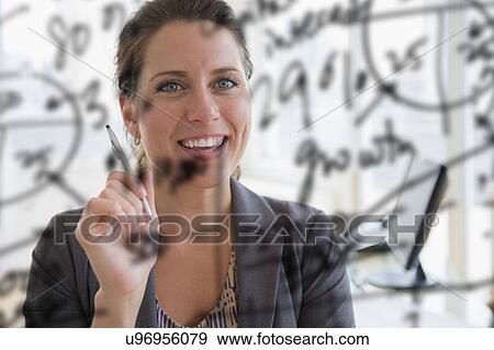 Portrait of woman in office View Large Photo Image Stock Photo - Portrait of woman in office. Fotosearch