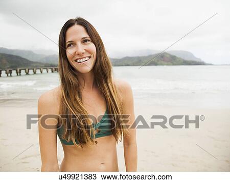 Portrait of young woman in swimsuit View Large Photo Image Stock Image - Portrait of young woman in swimsuit. Fotosearch