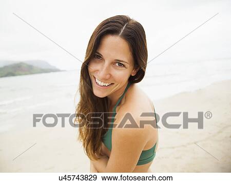 Portrait of young woman in swimsuit View Large Photo Image Stock Photo - Portrait of young woman in swimsuit. Fotosearch