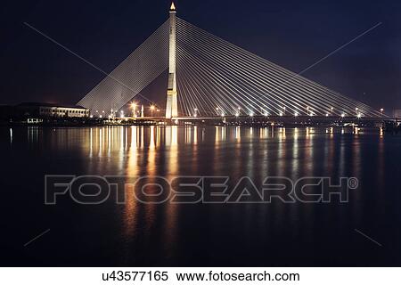 Stock Photography - Rama VIII Bridge on Chao Phraya River. Fotosearch
