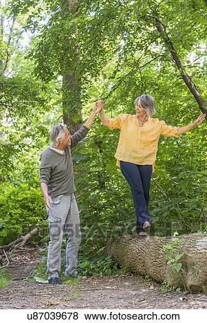 Senior couple hiking in forest View Large Photo Image Stock Photo - Senior couple hiking in forest. Fotosearch