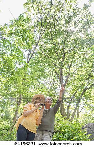 Senior couple in park View Large Photo Image Stock Image - Senior couple in park. Fotosearch