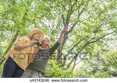 Senior couple in park View Large Photo Image Stock Photograph - Senior couple in park. Fotosearch