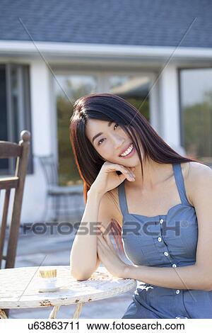 Stock Image - Smiling woman. Fotosearch