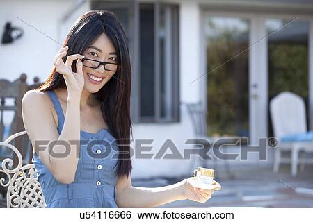 Stock Photograph - Smiling woman. Fotosearch