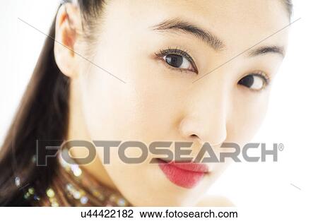 Studio portrait of young woman View Large Photo Image Stock Image - Studio portrait of young woman. Fotosearch