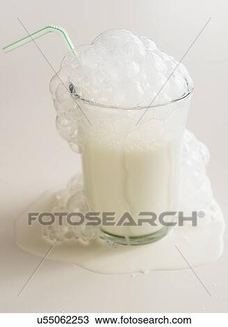 Stock Image - Studio Shot of spilled milk . Fotosearch
