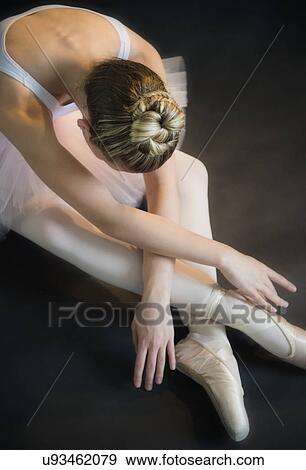 Teenage (16-17) ballerina bending over View Large Photo Image Stock Photo - Teenage (16-17) ballerina bending over. Fotosearch
