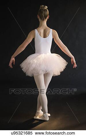 Stock Photography - Teenage (16-17) ballerina on stage. Fotosearch