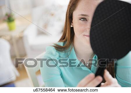 Teenage girl (14-15) with hand mirror View Large Photo Image Picture - Teenage girl (14-15) with hand mirror. Fotosearch